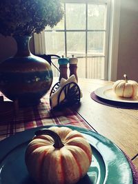 Close-up of food on table by window