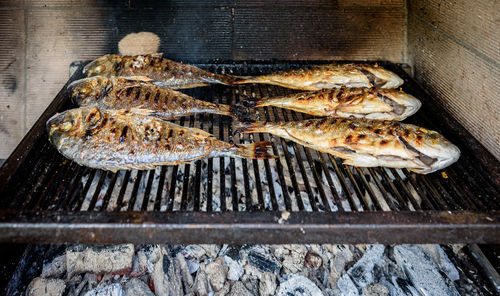 Close-up of fish on barbecue grill