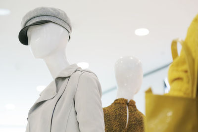 Low angle view of mannequins in store