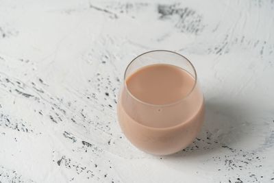 High angle view of coffee cup on table