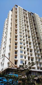 Low angle view of buildings against clear sky