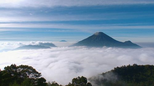 Scenic view of volcanic mountain against sky