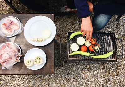 Low section of man having food