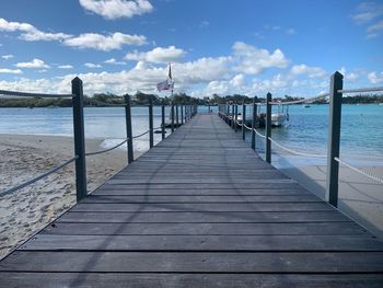 Pier over sea against sky