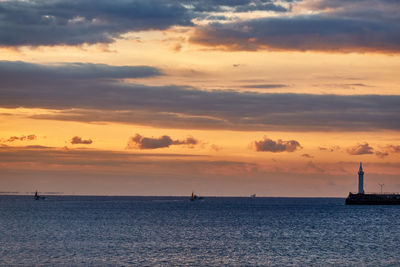 Scenic view of sea against sky during sunset