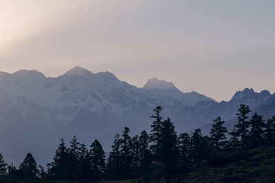 Scenic view of mountains against sky during sunset