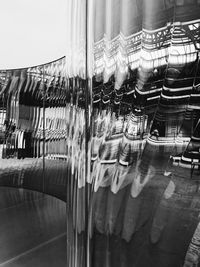 Close-up of glass with reflection of lights