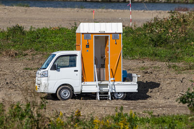 Full frame view of portable toilet on a truck