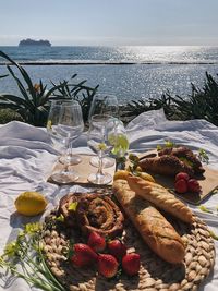 High angle view of breakfast on table at beach