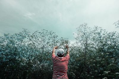 Man against trees