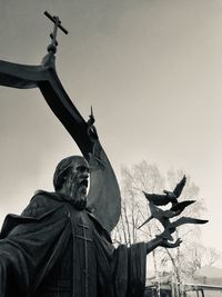 Low angle view of statue against clear sky