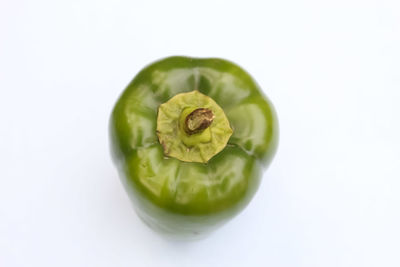 Close-up of lemon slice over white background