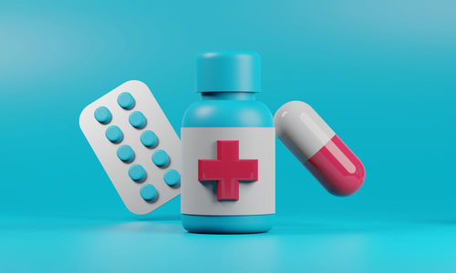 Close-up of pills against blue background