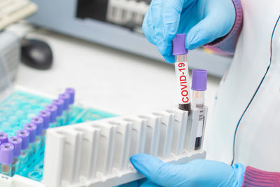 Midsection of person with text