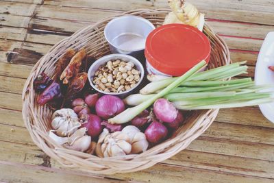 High angle view of vegetables in basket on table