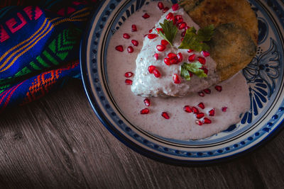 Chile en nogada on a talavera plate from puebla, traditional cuisine of mexico