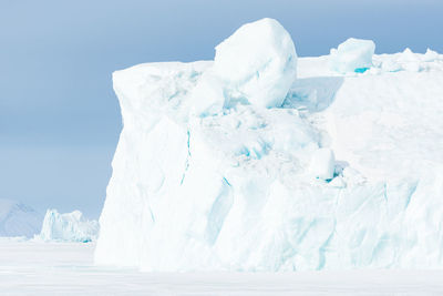 Ice bergs on frozen sea, greenland.