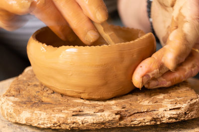 Close-up of person preparing food