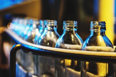 Close-up of wine bottles on table