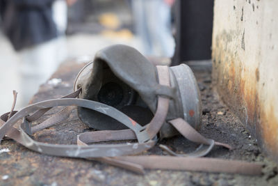 Close-up of abandoned shoes on table