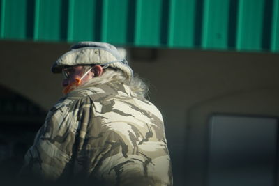 Rear view of man looking away