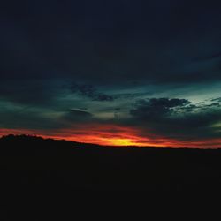 Low angle view of dramatic sky during sunset