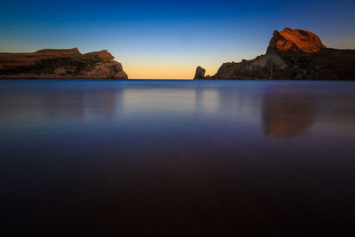 View of calm sea at sunset