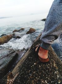 Low section of man on beach