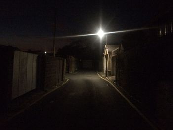 Illuminated street lights at night