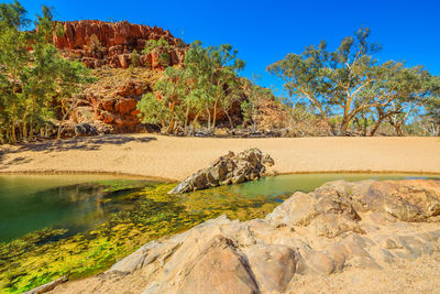 View of lake against rock formation