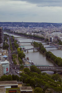 High angle view of city against cloudy sky