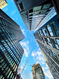 Low angle view of skyscraper against sky