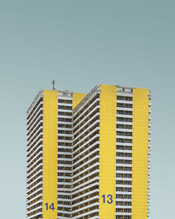 Low angle view of buildings against clear sky