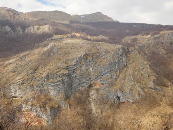 Scenic view of landscape and mountains against sky