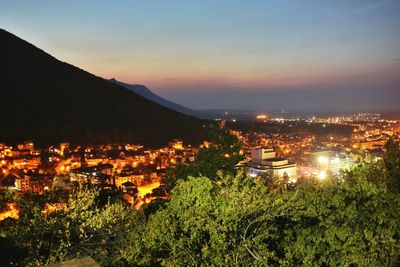 High angle view of illuminated cityscape at night