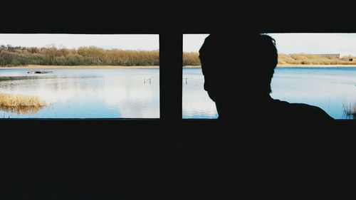 Scenic view of lake at sunset