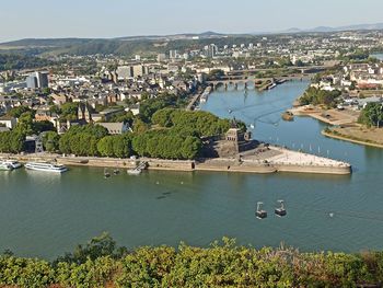 High angle view of river amidst buildings in city