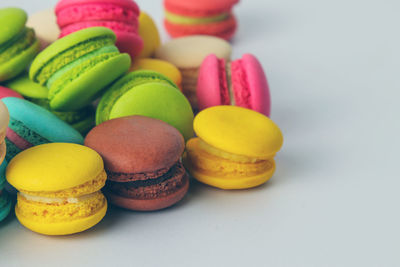 Close-up of macaroons on white background