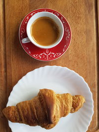 Directly above shot of coffee served on table