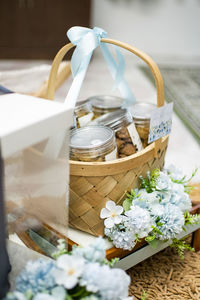 Close-up of jars of biscuits in a basket