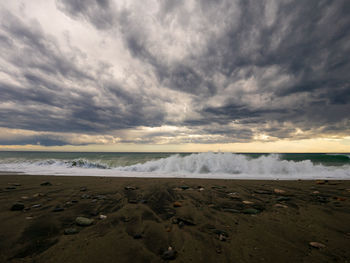 Scenic view of beach against sky