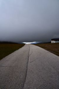 Surface level of empty road against sky