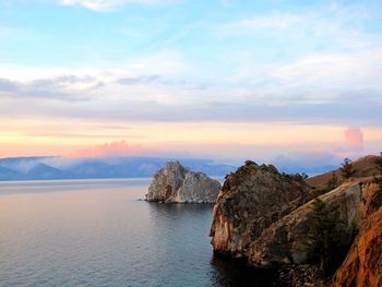 Scenic view of sea against cloudy sky