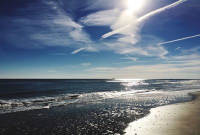 Scenic view of beach against sky