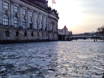 View of buildings in water