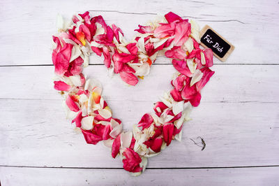 Directly above shot of pink flower on table