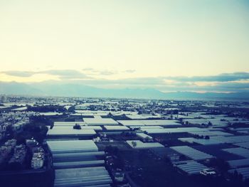 Aerial view of cityscape against sky