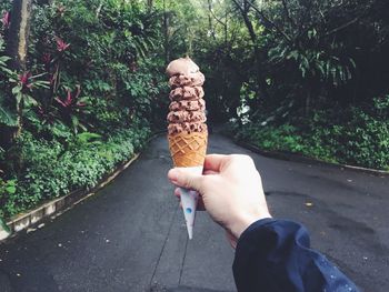 Close-up of young woman holding hands
