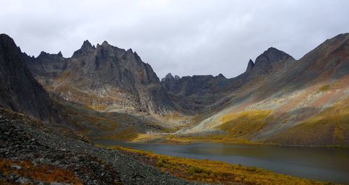 Panoramic view of lake and mountains against sky