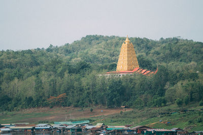 View of temple on building against sky